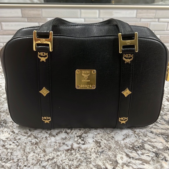 MCM Black and Gold Satchel with Classic Design - Picture 1 of 6